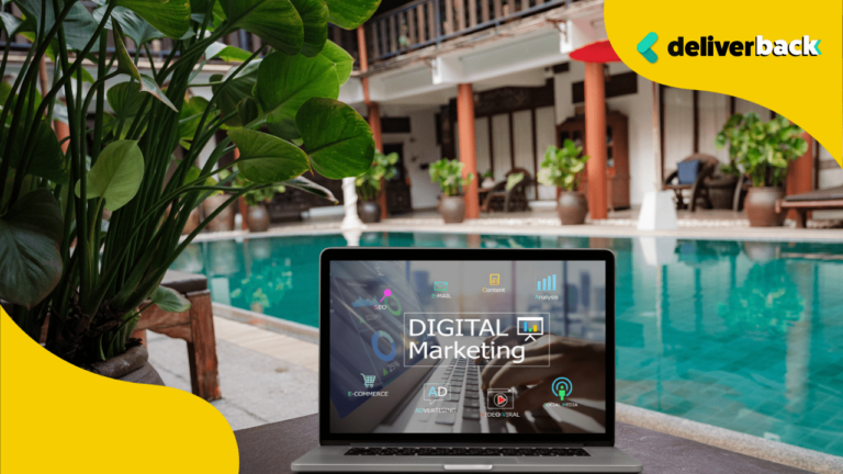 A laptop in front of a hotel pool